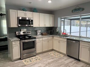 Fridge, microwave, oven, stovetop - Newly renovated single family home with direct water  access to Tampa Bay (Apollo Beach)