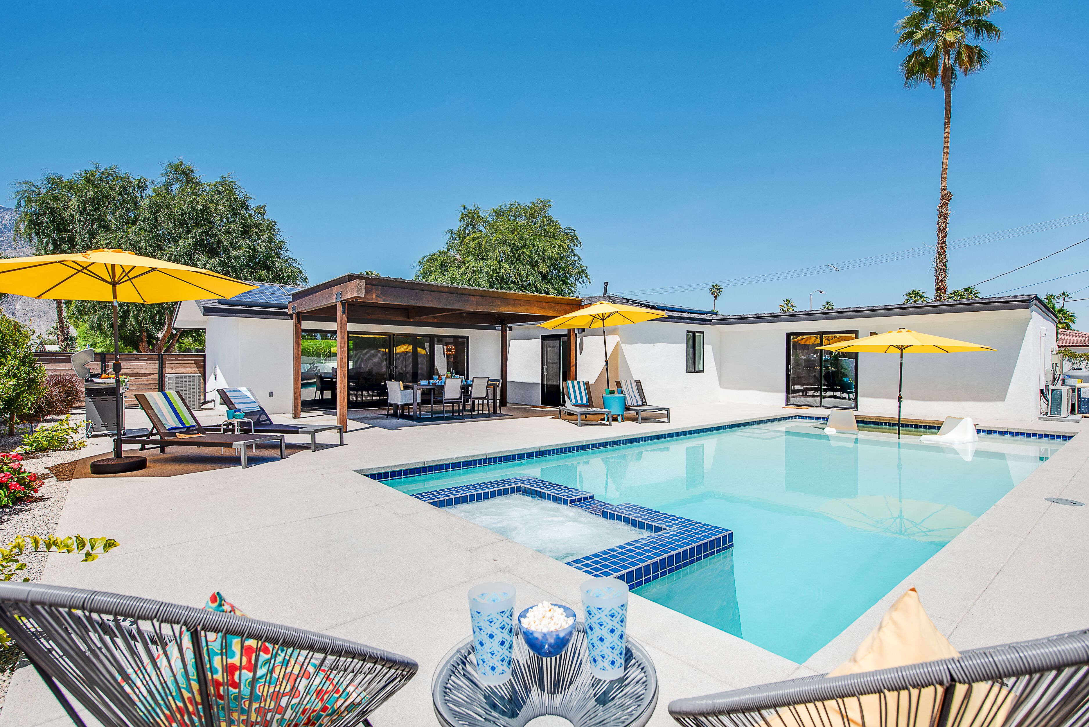 Casual Elegance Pops in this Well-Suited 4BD/4BA with Casita