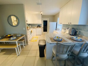 Fridge, microwave, oven, stovetop - Waterfront Palm Cottage (Micco)