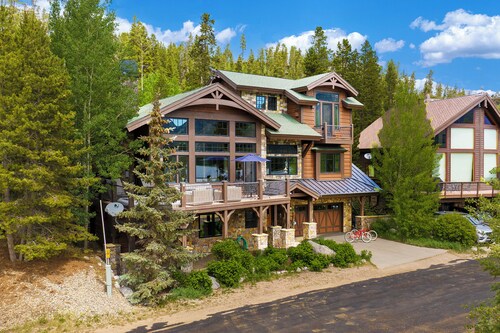 Stunning Lake Views with private boathouse deck, hot tub and close walk to town