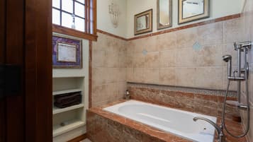 Combined shower/tub, hair dryer, towels, soap