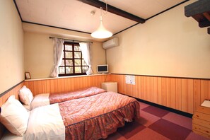 Habitación con 2 camas individuales | Wifi gratis y ropa de cama
