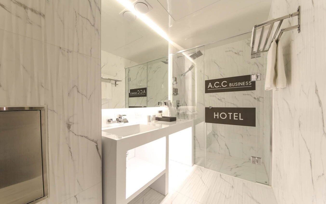 standard double room | bathroom | shower, hair dryer, towels, soap