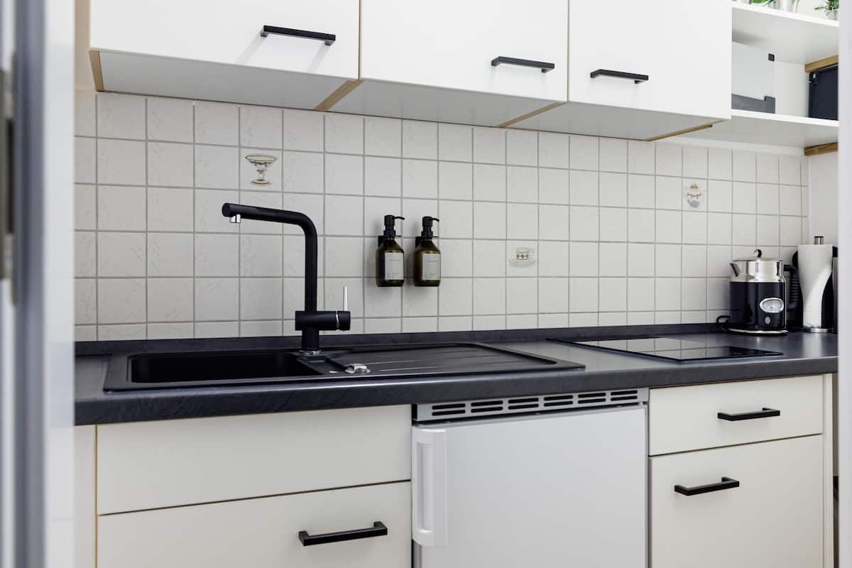 standard condo, 1 bedroom, kitchenette, ground floor | 1 bedroom, hypo-allergenic bedding, individually decorated