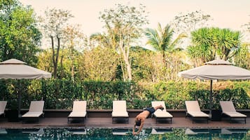 Outdoor pool, open 6:00 AM to 8:00 PM, pool loungers, lifeguards on site