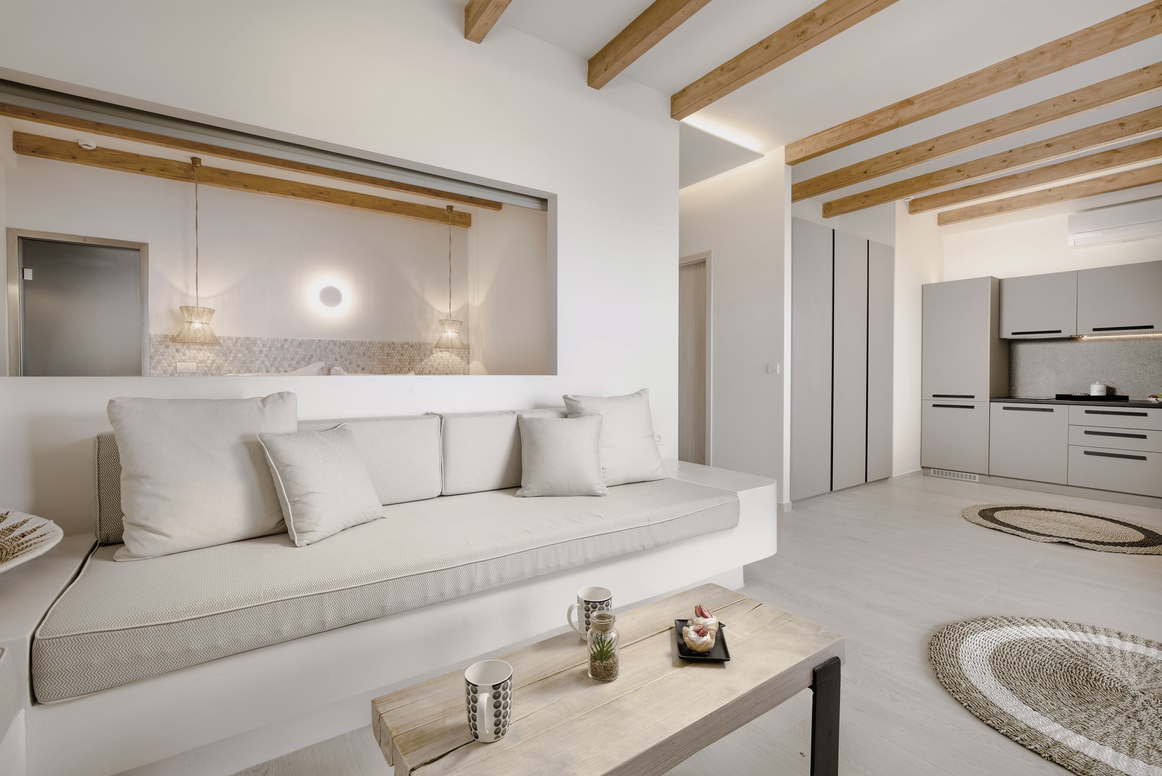 grand suite, private pool, sea view | living area | tv