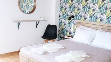 Double Room, Garden View | In-room safe, iron/ironing board, free WiFi, bed sheets