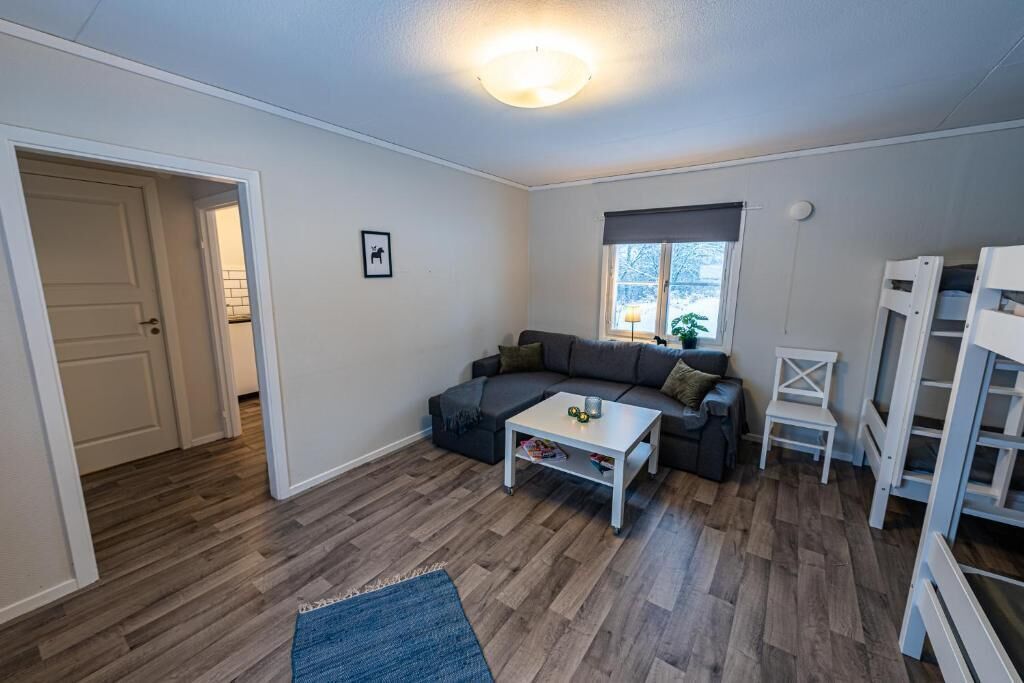 Huisje, 1 slaapkamer | Woonruimte | Een flatscreentelevisie en vloerverwarming