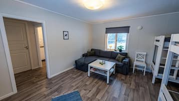 Huisje, 1 slaapkamer | Woonruimte | Een flatscreentelevisie en vloerverwarming