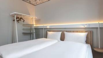 Standardzimmer, 2 Einzelbetten | 1 Schlafzimmer, schallisolierte Zimmer, kostenloses WLAN, BettwÀsche