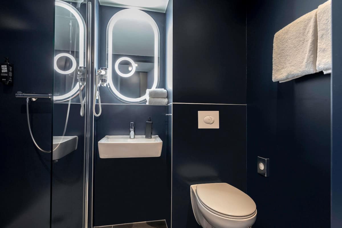 shower, eco-friendly toiletries, towels