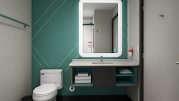 Un baño moderno con inodoro blanco, pared de acento color turquesa, lavamanos blanco con espejo y un perchero para toallas.