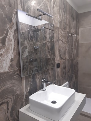 Free toiletries, hair dryer, bidet, towels