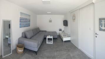 Family Villa, Private Pool | Living area | 110-cm LCD TV with satellite channels, TV