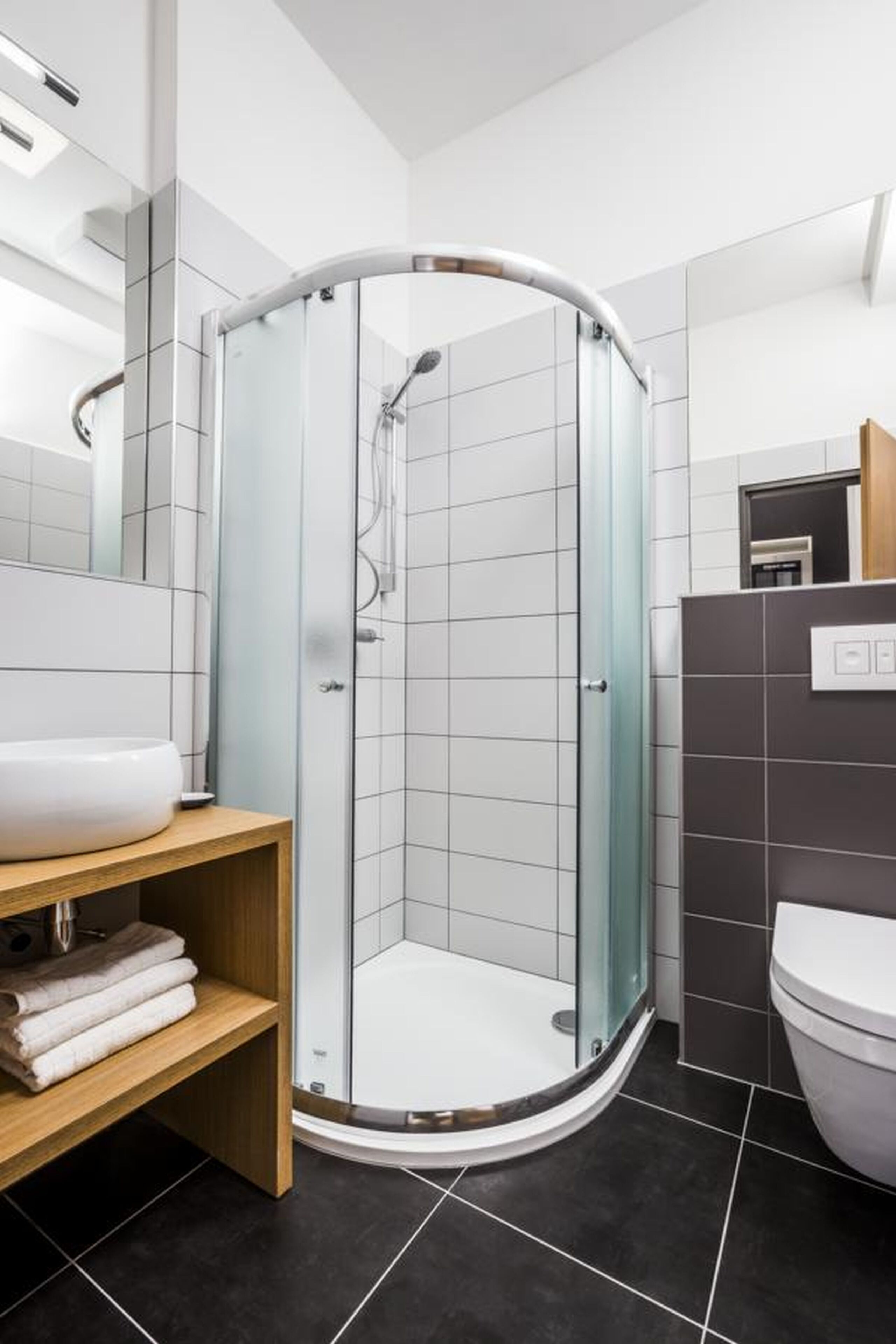 shower, towels, soap, toilet paper