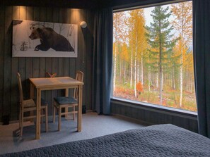 Cabaña de lujo, 1 cama Queen size, vista al parque, junto a la pista de ski | 1 habitación, ropa de cama de alta calidad y camas con efecto memoria 