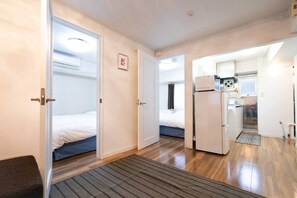 Apartment, 2 Bedrooms | Iron/ironing board, bed sheets