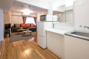 Apartment, 2 Bedrooms | Private kitchen | Fridge, microwave, stovetop, electric kettle
