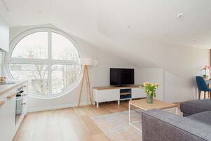 Exclusive Apartment (31) | Living area | 42-inch flat-screen TV with satellite channels, TV