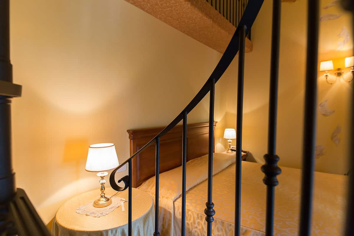 deluxe suite, balcony | 1 bedroom, down duvets, in-room safe, desk