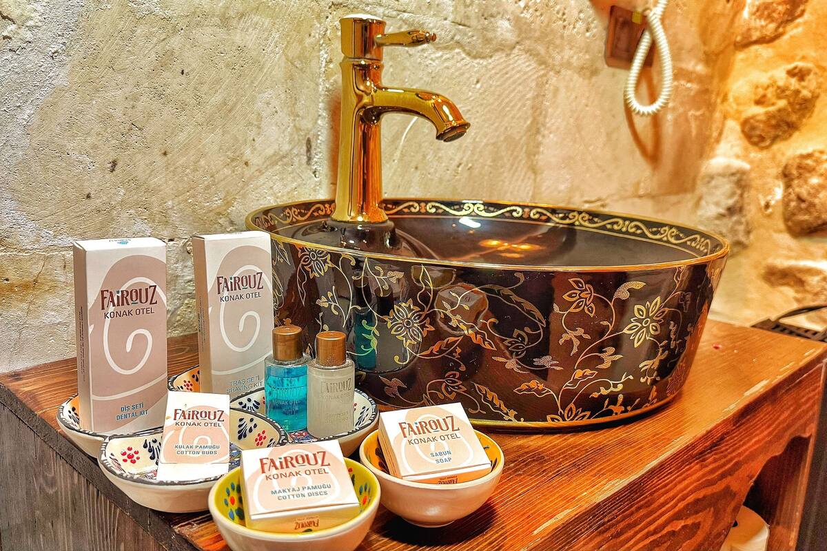 luxury room, 1 king bed, sauna | bathroom | rainfall showerhead, designer toiletries, hair dryer, slippers