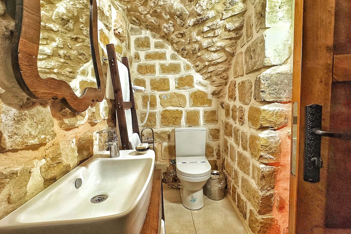 comfort room, multiple beds, courtyard view | bathroom | rainfall showerhead, designer toiletries, hair dryer, slippers