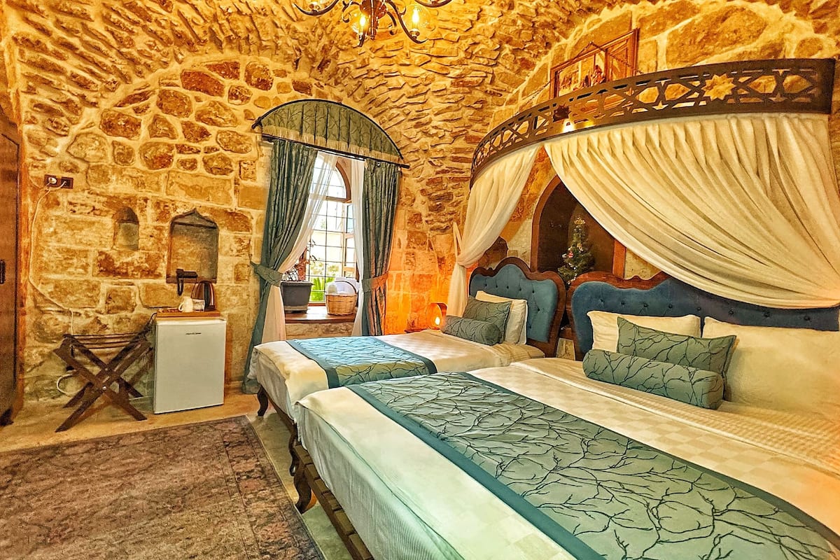 comfort room, multiple beds, courtyard view | 1 bedroom, frette italian sheets, premium bedding, memory-foam beds