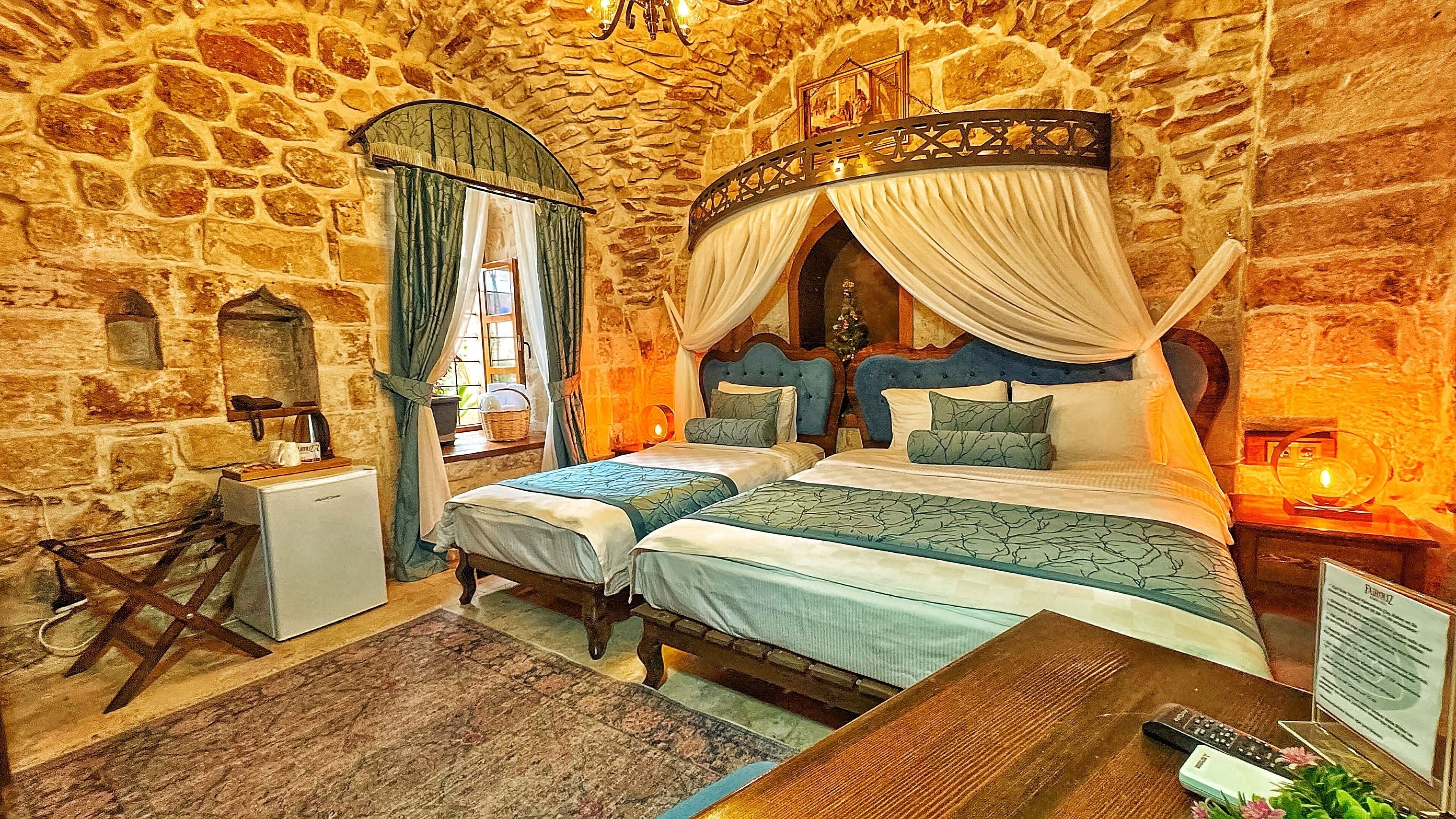 comfort room, multiple beds, courtyard view | 1 bedroom, frette italian sheets, premium bedding, memory-foam beds