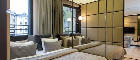 Apartamento superior | 1 dormitorio, sistema de insonorización, tabla de planchar con plancha