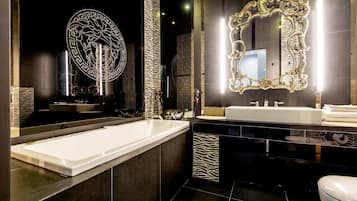 Design Apartment | Bathroom | Bathtub, hair dryer, bidet, towels