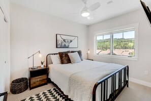 2 bedrooms, premium bedding, iron/ironing board, travel crib