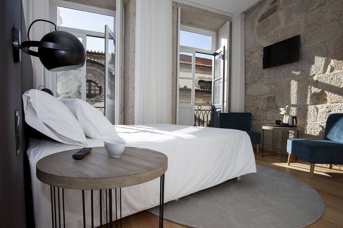 Habitación doble Deluxe | Ropa de cama hipoalergénica, edredón y camas con efecto memoria 