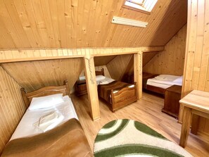 Triple Room (Mansard) | Soundproofing - Villa Nikoletta (Bukovel)