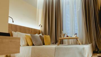 Premium bedding, down duvets, minibar, in-room safe