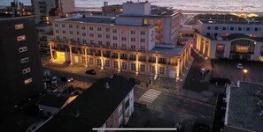 Stunning hotel building with a classic, symmetrical facade and central entrance.