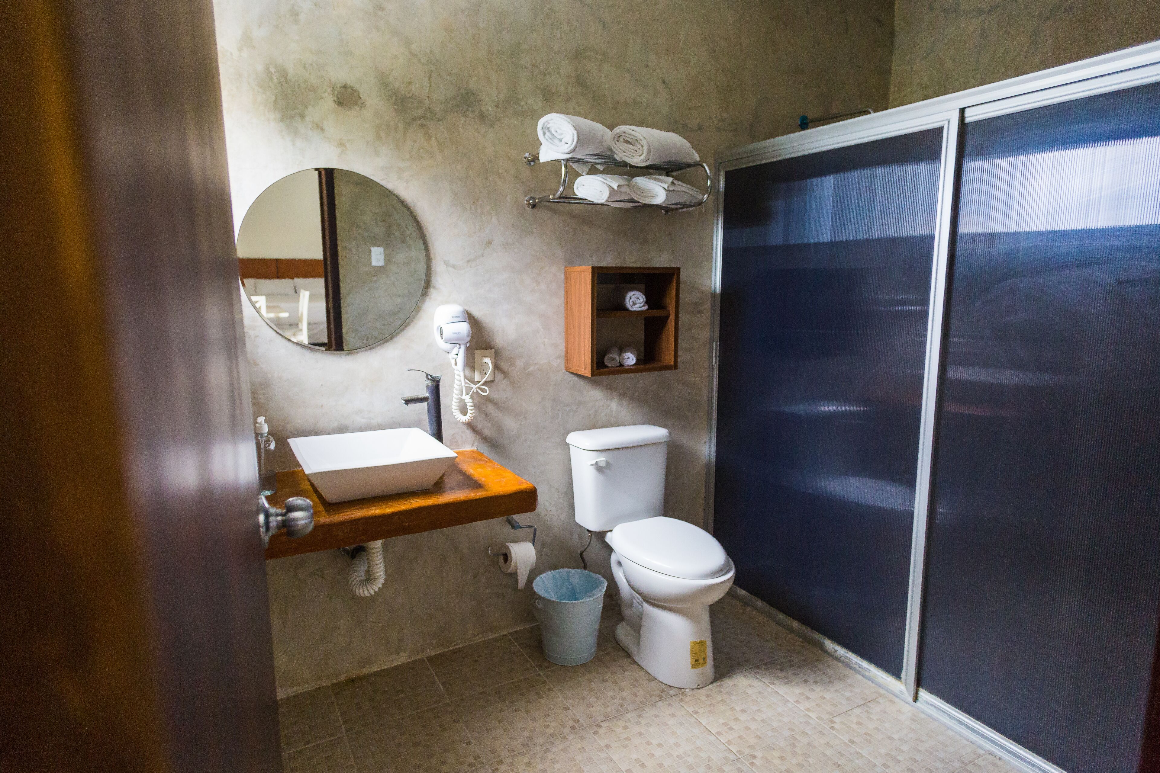 family room | bathroom | shower, rainfall showerhead, free toiletries, towels