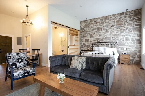 Unique Rustic Suite with Jacuzzi Tub, Kitchen, Fireplace, and Living Room