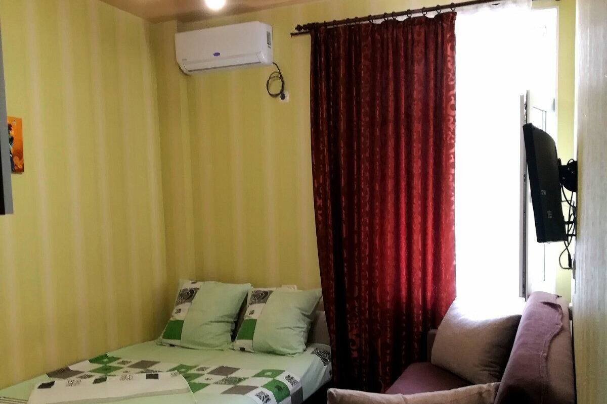Desk, laptop workspace, blackout curtains, iron/ironing board