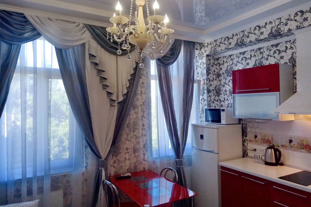Desk, laptop workspace, blackout curtains, iron/ironing board