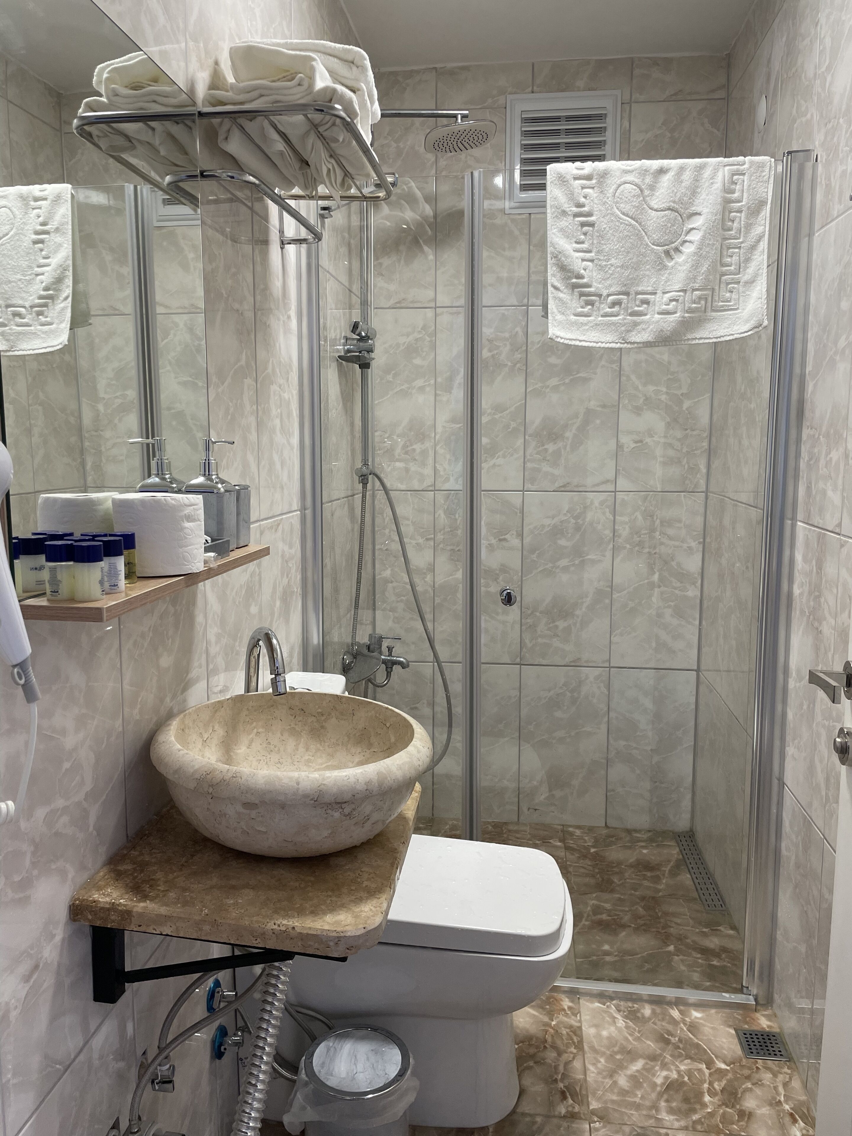 economy room, ground floor | bathroom | shower, free toiletries, hair dryer, slippers