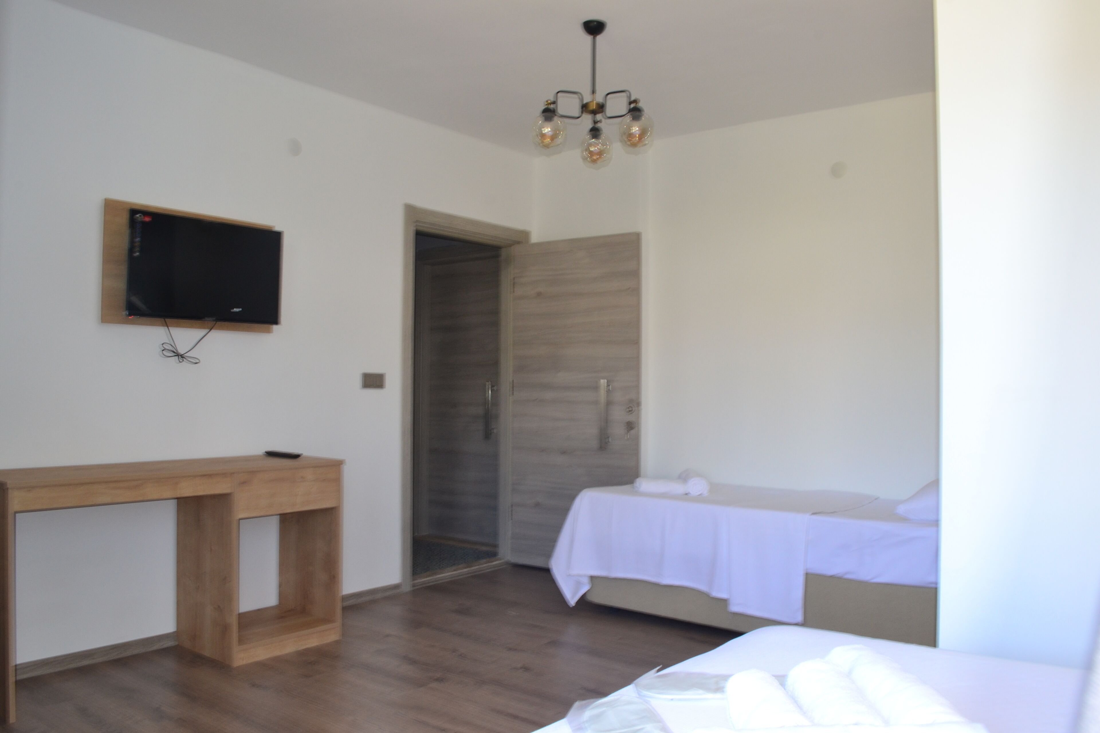 triple room, balcony, garden view | 1 bedroom, minibar, laptop workspace, soundproofing