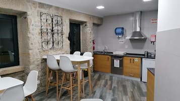 Mini-fridge, microwave, toaster, cookware/dishes/utensils