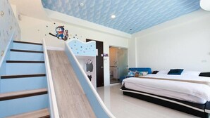 A bedroom with a bed, a staircase, and a bathroom visible in the background. - Candy House (Wujie)