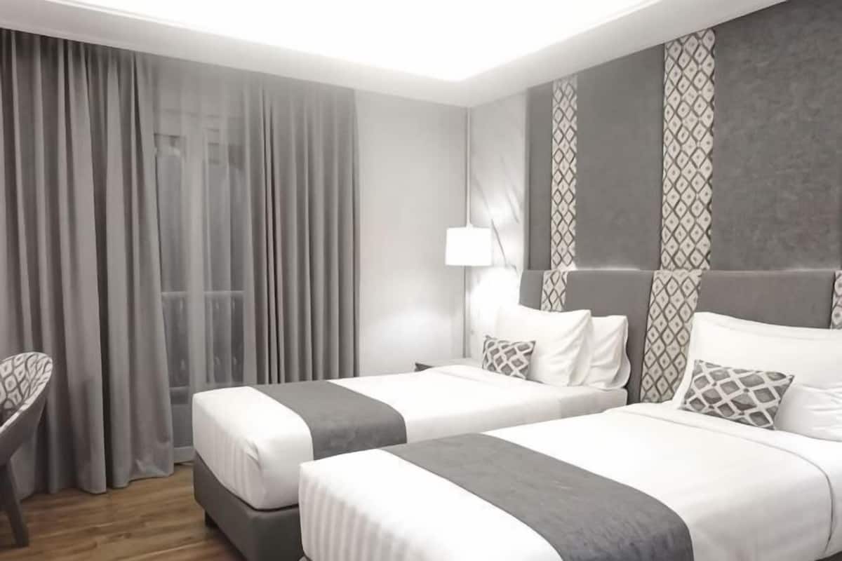 Premium bedding, in-room safe, desk, soundproofing