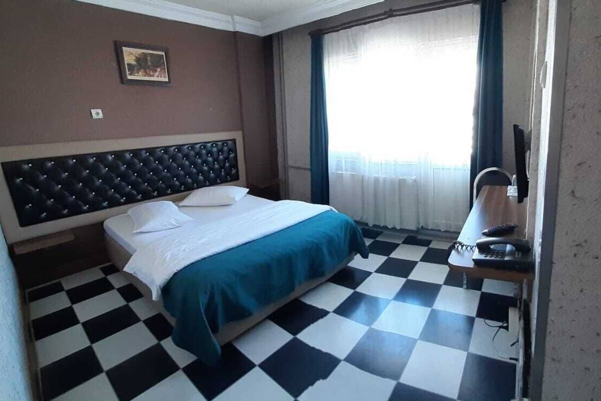 Desk, laptop workspace, free WiFi, bed sheets