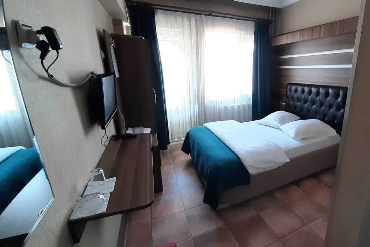 Desk, laptop workspace, free WiFi, bed sheets