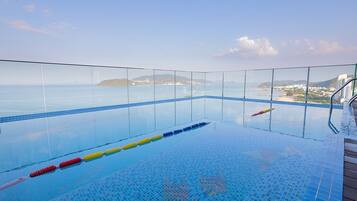 Outdoor pool, open 10:30 AM to 6:00 PM, pool loungers