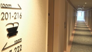 A hotel corridor with room numbers 201-216 and 217-222. - Henn na Hotel Premier Nara (Nara)