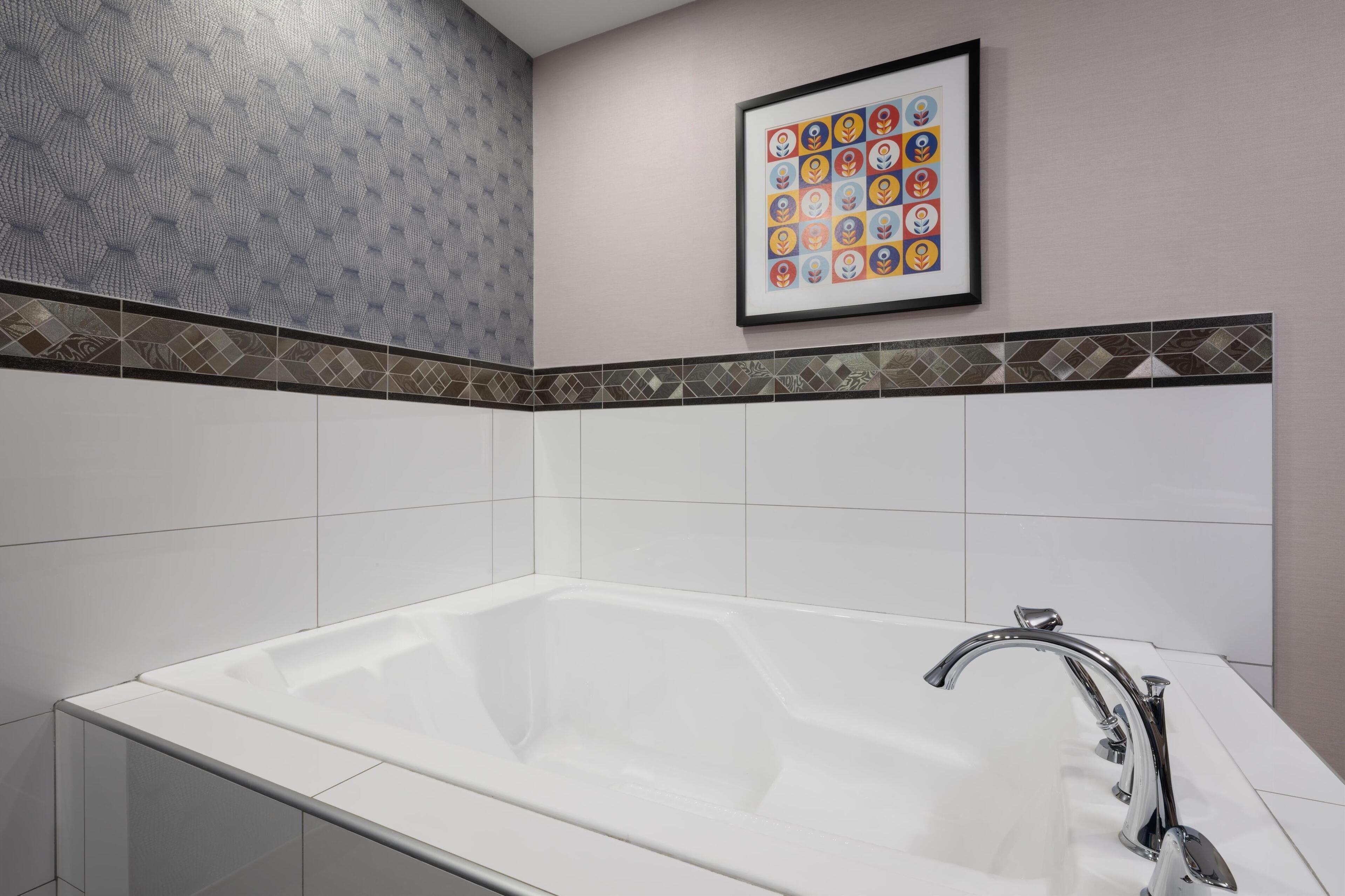 suite, 1 king bed, non smoking, jetted tub (with sofabed, full kitchen) | 1 bedroom, premium bedding, pillow-top beds, in-room safe