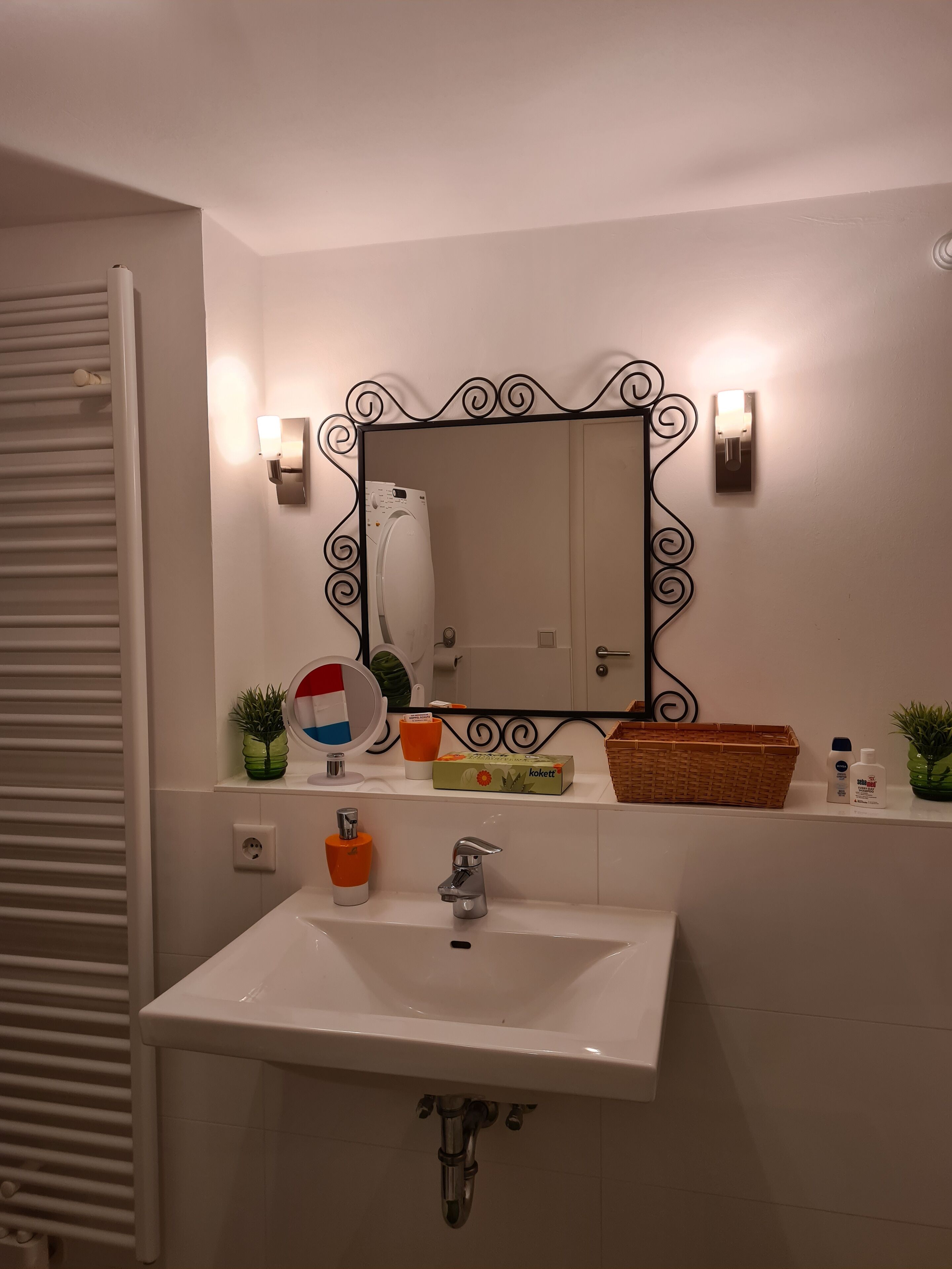 Bathtub, hair dryer, towels, soap